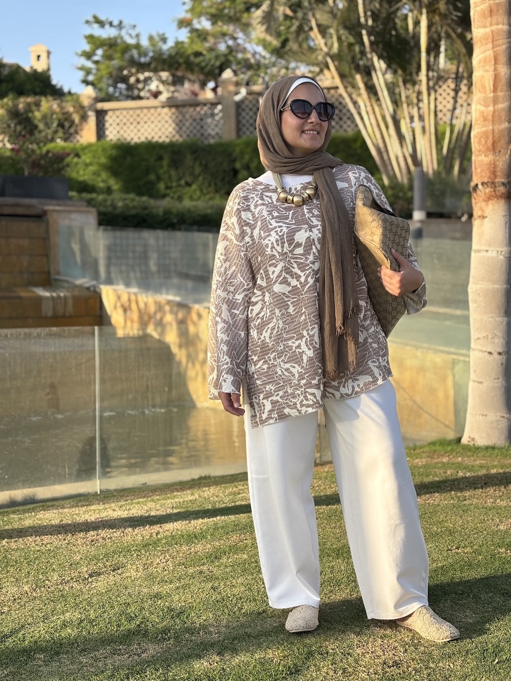 Airy knit cotton blouse in a neutral tone, stretch fabric with a relaxed fit