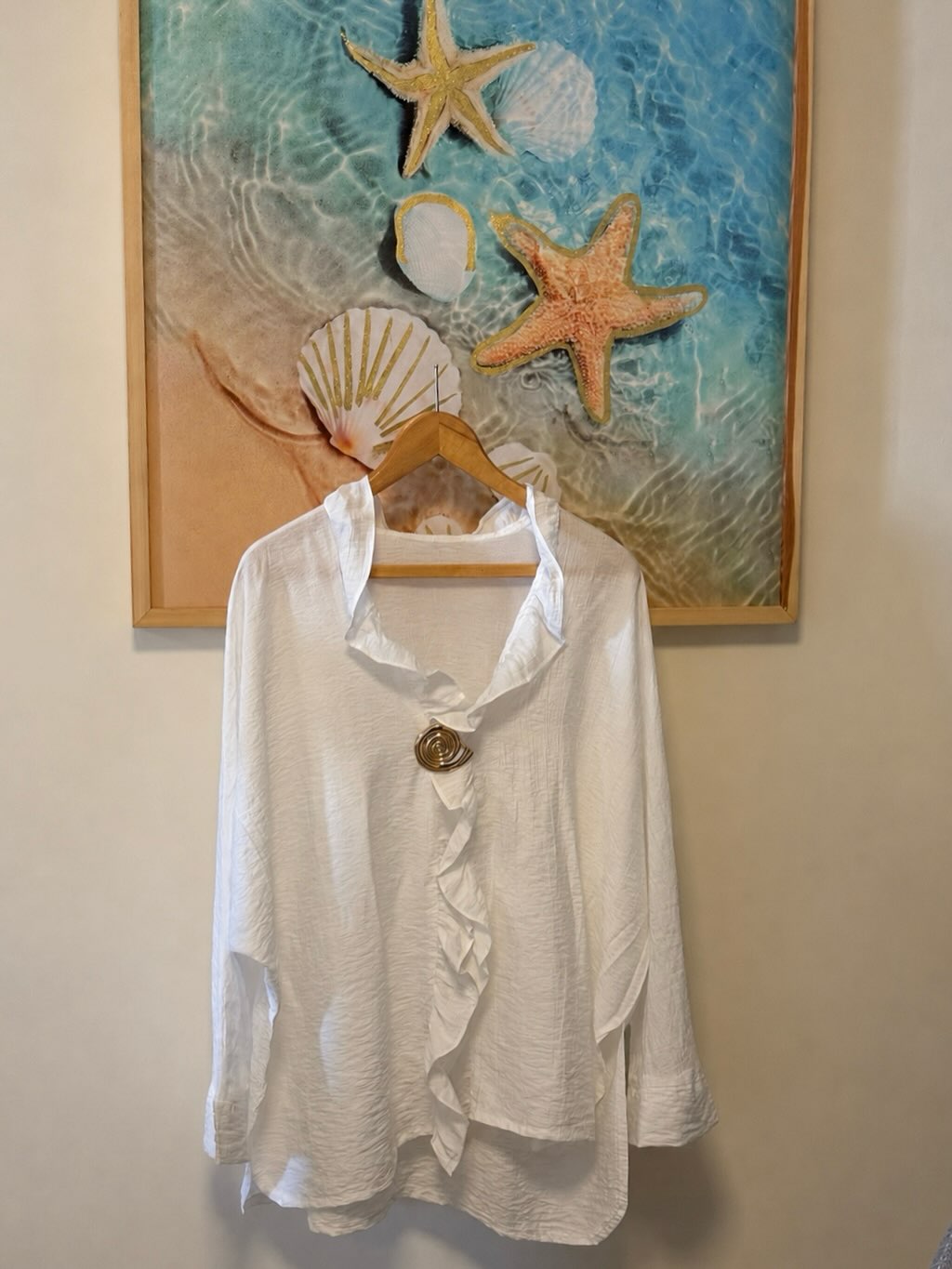White and black blouse-style dress with classic design
